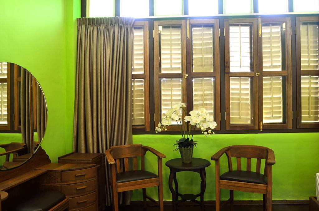 Yong Yi Yuen Guesthouse George Town Ruang foto
